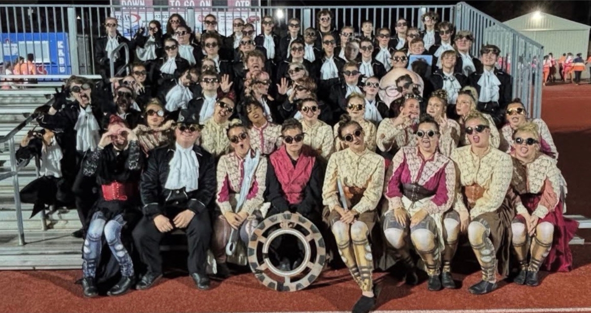 LHS band posing with Steampunk outfits